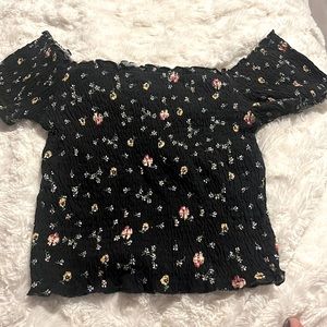 Flowers on a black off the shoulder
